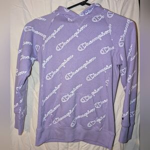 Girls size large (fits like a ladies size Small) purple Champion hoodie